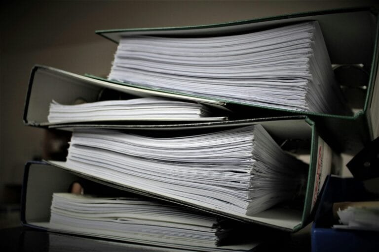 Stack of reports - showcasing ES Firmino Asbestos Inspection Inc. ACP-5 Reports service